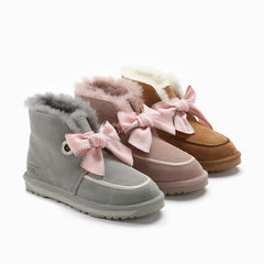UGG PAISLEY POM POM BOOTS